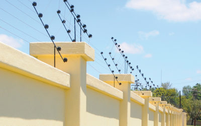 Electric security fence protects residential complex